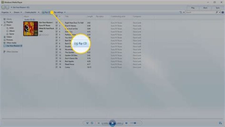 How do I transfer music from Windows Media Player to a flash drive?